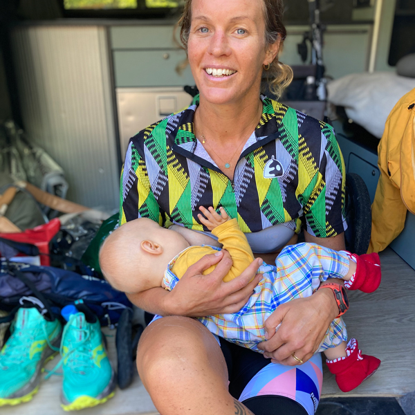 Jody Smith breastfeeding during training for the half Ironman