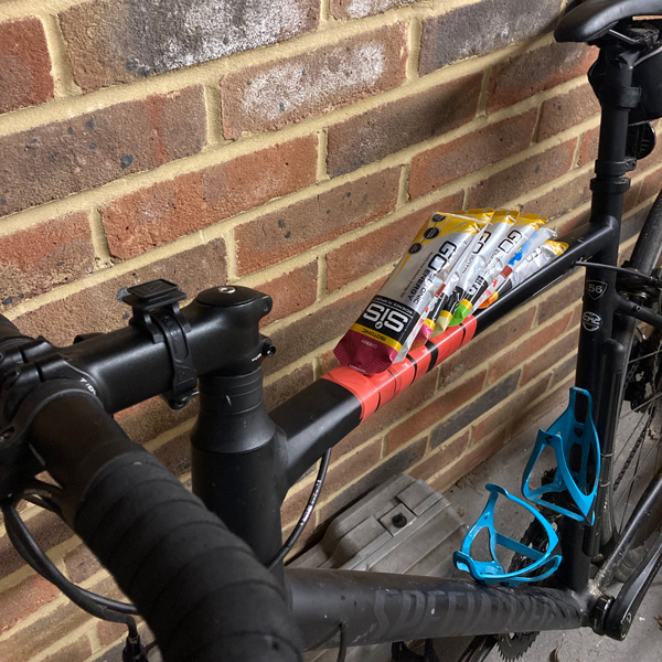 Photo of Jody Smiths bike with hydration and energy gels strapped to it